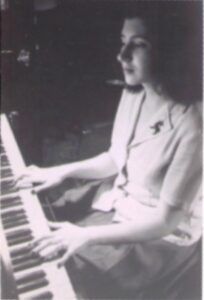 Ruth at piano.